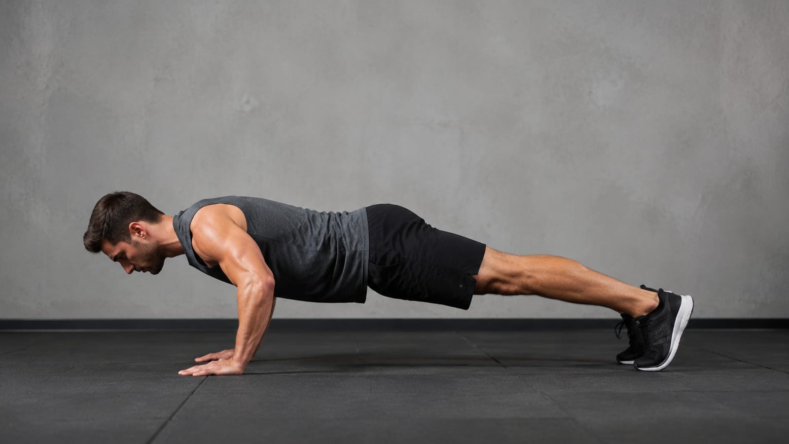 Side view of solid plank form during the burpee push-up